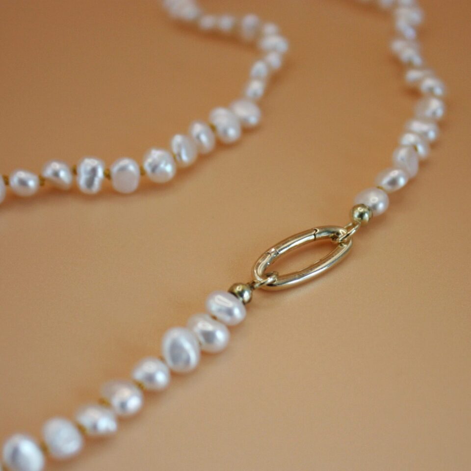 Handknotted pearl necklace with 14k gold clasp