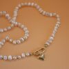 Pearl necklace with gold clasp